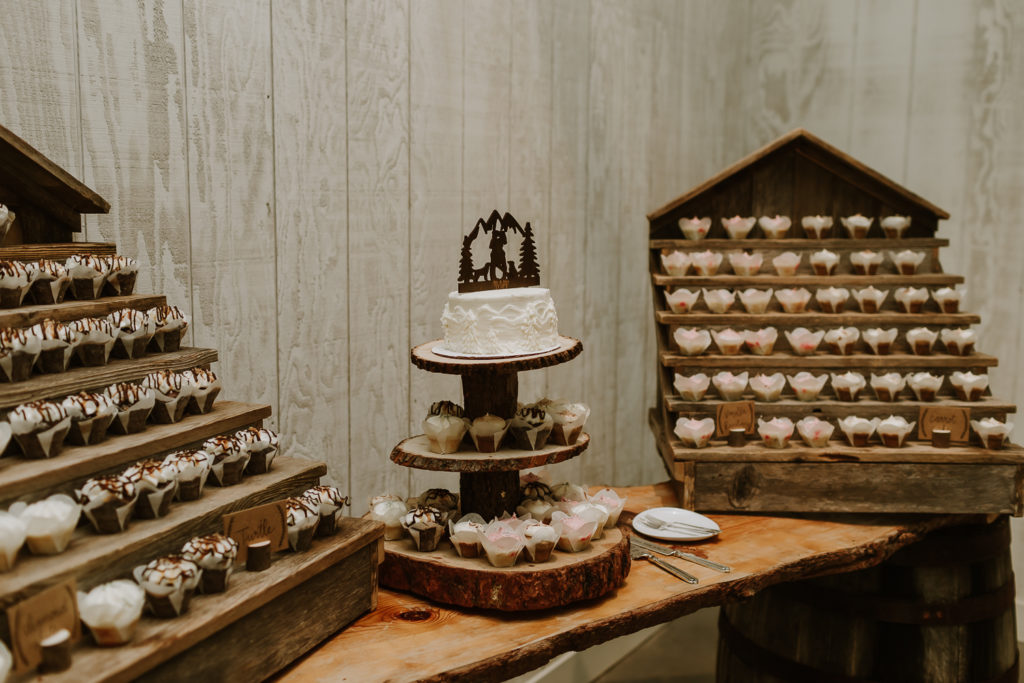 wedding cake and cupcake display